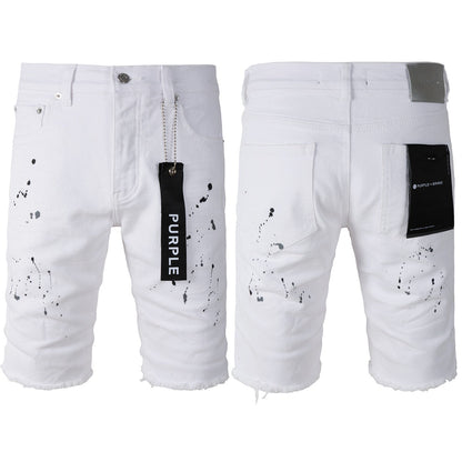 Los nuevos pantalones vaqueros de tendencia de personalidad masculina, pantalones cortos de mezclilla blancos con agujeros 5021 