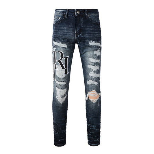 Jeans Slim Fit Small Foot 1324 de Street Tide Fashion européen et américain avec broderie de lettres déchirées 